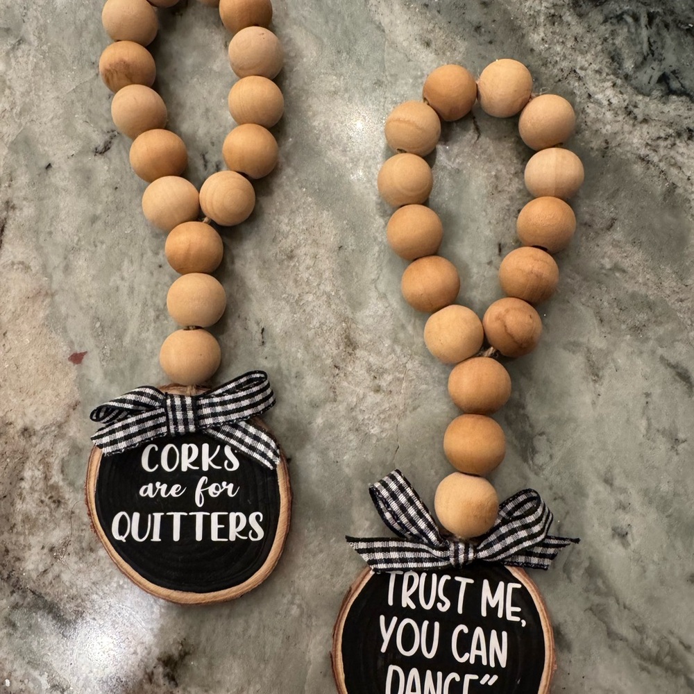 Pair of Wooden Bead Wine Bottle Charms with Whimsical Quotes - Picture 2 of 5